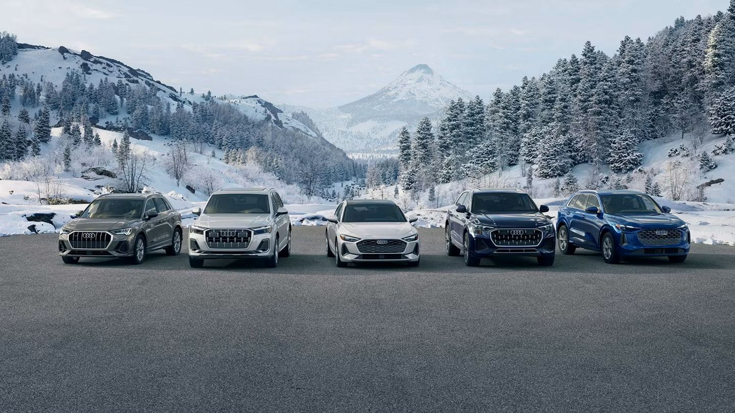 Auid tech checking the under panels of used Audi SUV